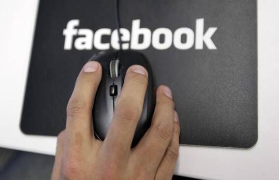 A Facebook User Operations Safety Team worker looks at reviews at Facebook headquarters in Menlo Park, Calif., Tuesday, Dec. 13, 2011. Facebook is making it easier for Facebook users who express suicidal thoughts to get help. A program launching on Tuesda