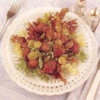 Foies de volaille chauds en salade