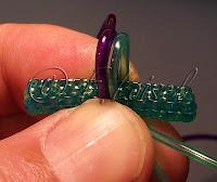 Superposition de scoubidous à 4 fils