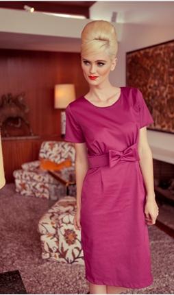 With a lady-like bow and sleek, straight silhouette, this frock is the essence of lovely.  Made from a thick, pink canvas, this dress has cap sleeves and a back zipper.  A perfect outfit for falling in love.