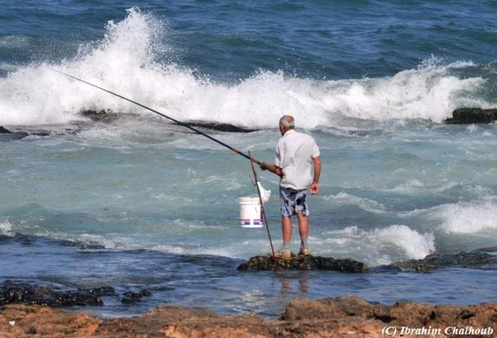 Malgré les vagues! Photo (C) Ibrahim Chalhoub