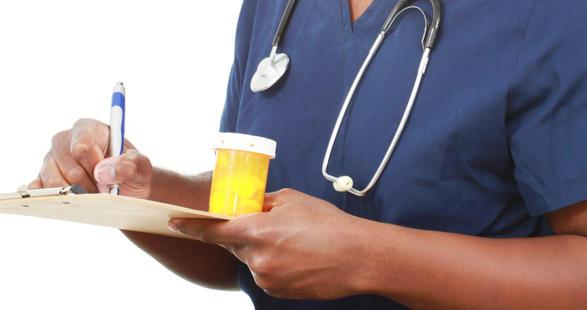 doctor writing down notes