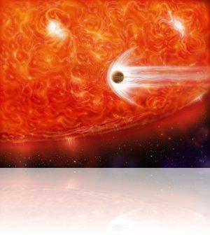 Une planète absorbée par son étoile (vue d'artiste). Crédit : NASA