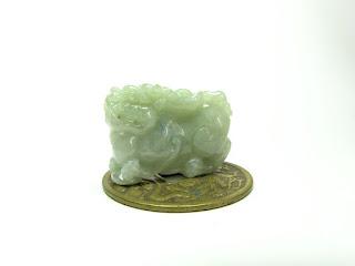 Pi Xiu en jade avec lingot sur le dos