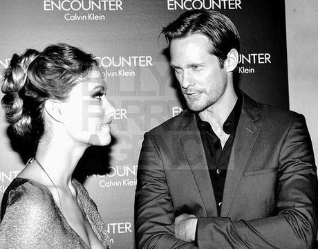 Alexander Skarsgard chats with Olivia Wilde at the Calvin Klein “Encounter” launch party (September 27, 2012). (Source:  bfanyc.com)