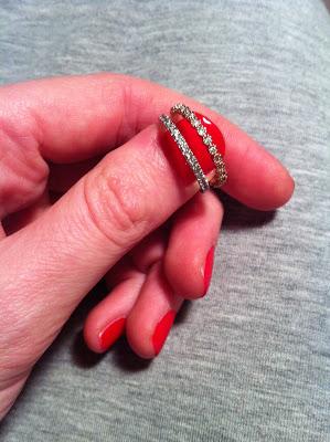 Jewellery and red nail polish