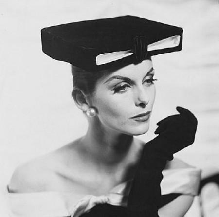 Model-wearing-academic-box-hat-black-gloves-and-pearl-earrings.Henry-Clarke-1955.©-Condé-Nast-ArchiveCorbis-e1347614591809.jpeg