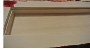 Coupelle de Noël, application de la peinture rouge après une couche de gesso