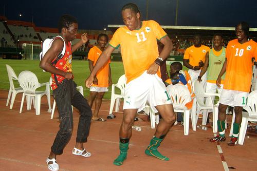 Didier Drogba forgets transfer talk to dance on stage at DJ Arafat gig