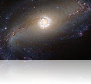 Photographie de la galaxie spirale NGC1097 prise par le télescope spatial Hubble en 2012. Crédit image : NASA/ESA/Hubble