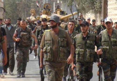 Eléments de l'armée syrienne entrant à Raqqa 