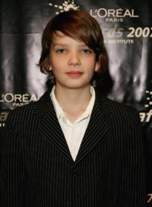 Kodi Smit-mcphee, vu dans Laisse-moi Entrer