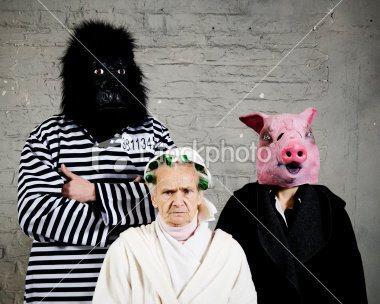 Nos amis les banques d’images stock-photo-10527025-man-and-women-in-gorilla-pig-costume-or-old-lady