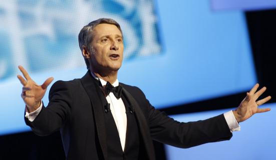 Master of Ceremony Antoine de Caunes gives a speech during the 37th Cesar Awards ceremony in Paris