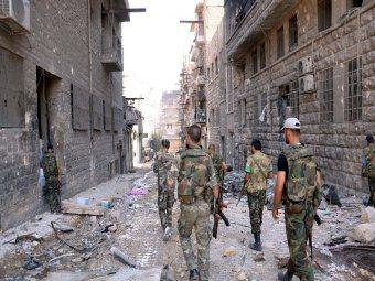 Armée syrienne dans les rues de Homs