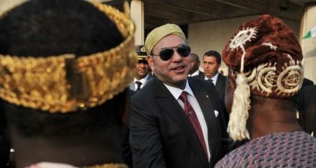 Mohammed VI en visite officielle en Côte d'Ivoire le 19 mars 2013.  ISSOUF SANOGO / AFP