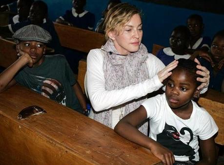 Madonna et ses enfants adoptif originaires du Malawi : David Banda et Mercy James.