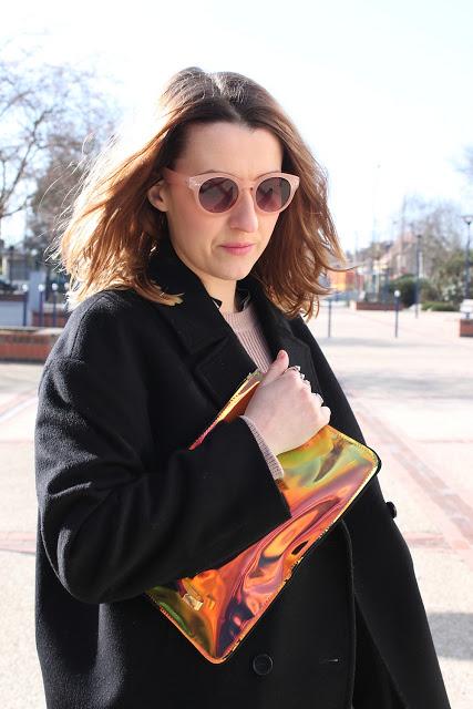 NEW LOOK - EMPHASIZED BY A HOLOGRAM CLUTCH