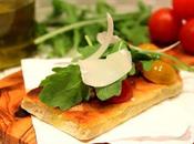 Tartine grillée l'huile d'olive, tomates, roquette parmesan