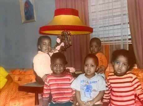 Michael in orange shirt near window, Latoya front-right, Marlon with white & blue shirt