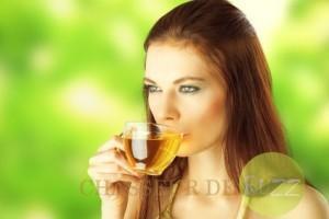Beautiful Girl Drinking Healthy Green Tea