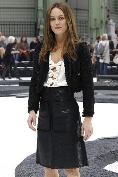 French singer Vanessa Paradis poses during a photocall before the Spring/Summer 2011 women's ready-to-wear fashion collection by German designer Lagerfeld for French fashion house Chanel in Paris