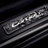 Aston Martin DB9 Carbon Black et Carbon White