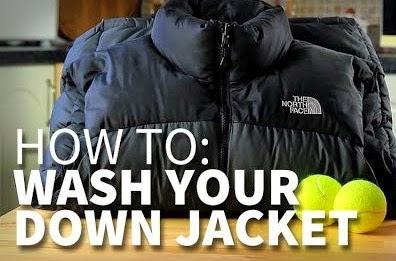 Doudoune et balles de tennis