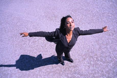 Businesswoman with Arms Outstretched