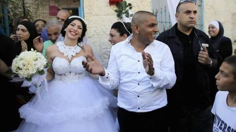 Le marié Mahmoud Mansour et son épouse Maral Mal-ka.