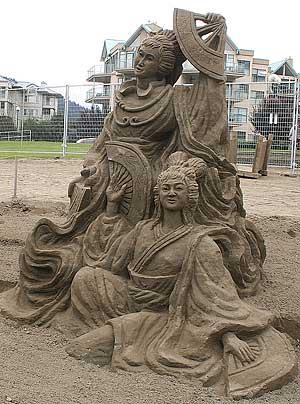 sand art sculpture dessin sable plage mogwaii (5)