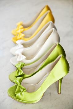 Fun coloured wedding shoes! Instead of all of the girls having the same colour, they can have within the wedding colours (white, green, pewter, and maybe yellow?!) Cute idea. Really like the green.