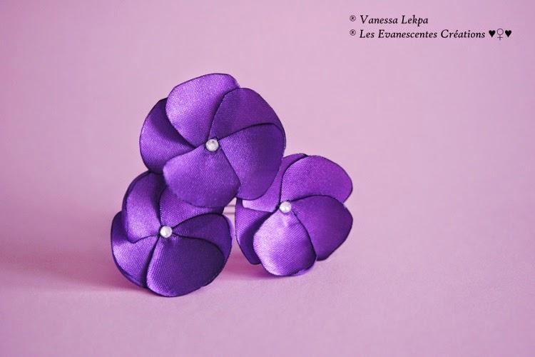 Vanessa Lekpa créateur français pics à chignon avec fleur de satin violet pour mariage et cérémonie petit prix