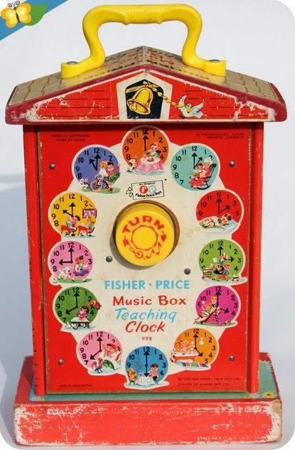 L'horloge -  Teaching Clock - Music Box de Fisher-Price