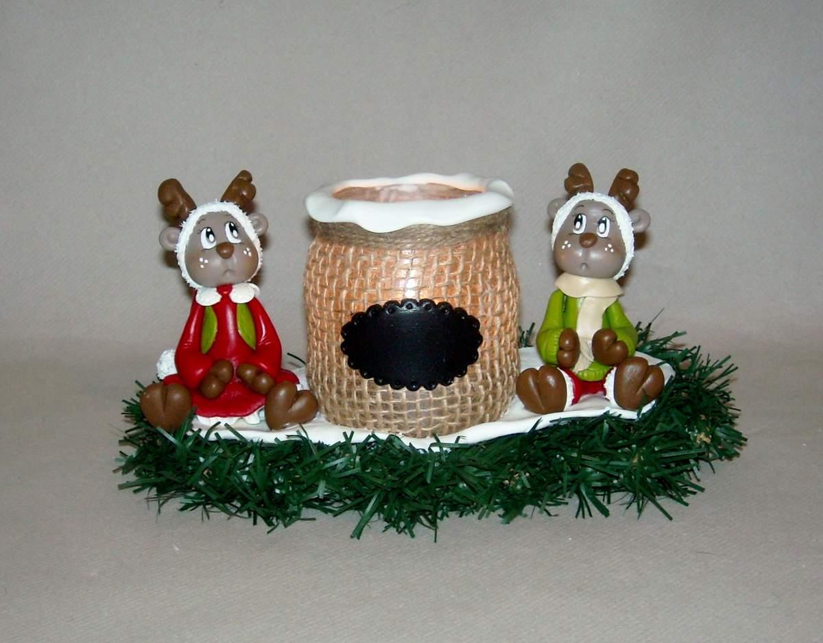 Porte-bougie avec couple de renne de Noël réalisé en porcelaine froide