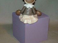 Tirelire avec ourson en porcelaine froide