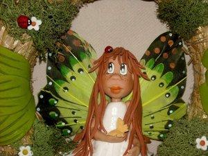 Couronne avec p'tite elfe papillon en porcelaine froide