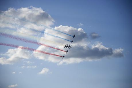 VERSAILLES, FRANCE - MAY 20:  A general view of the aerial display and fly past by the Patrouille de France in the gardens of the historic Chateau de Versailles on May 20, 2015 in Versailles, France.  (Photo by Kristy Sparow/Getty Images for Martell Cognac)