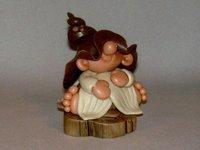 p'tit lutin sur rondin de bois flotté en porcelaine froide