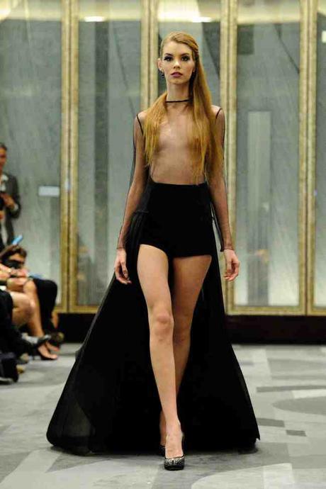 A model walks the runway for the Manu Reas Haute-Couture Fall/Winter 2015/2016 collection show at the Peninsula Hotel in Paris, France, on July 8, 2015. Photo by Aurore Marechal/ABACAPRESS.COM