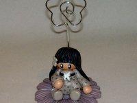 Porte-photo avec fillette en porcelaine froide