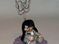 Porte-photo avec fillette en porcelaine froide