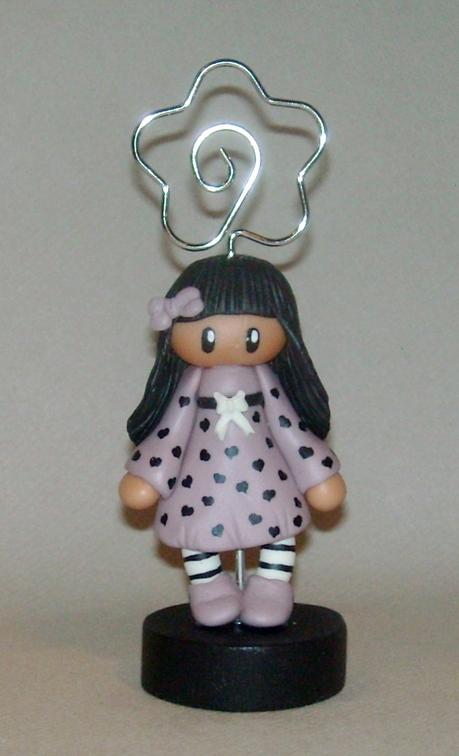 Porte-photo avec fillette en porcelaine froide