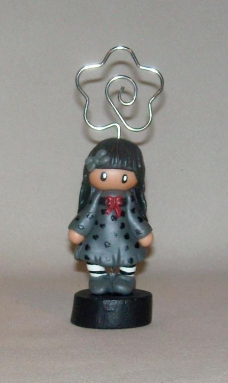 Porte-photo avec fillette en porcelaine froide