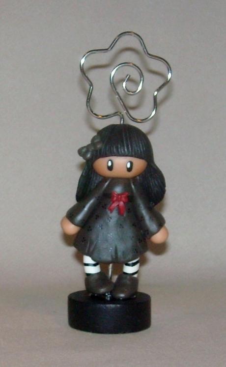 Porte-photo avec fillette en porcelaine froide