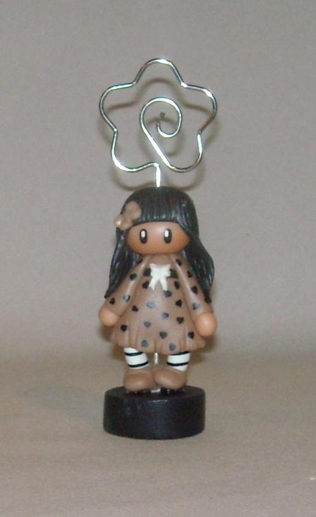 Porte-photo avec fillette en porcelaine froide