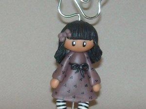 Porte-photo avec fillette en porcelaine froide