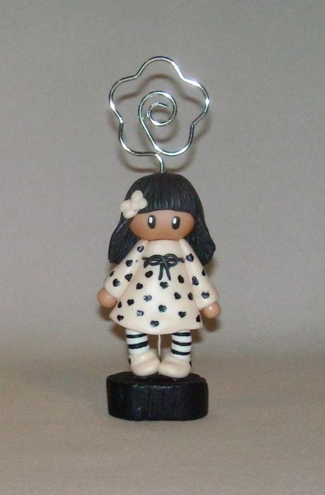 Porte-photo avec fillette en porcelaine froide