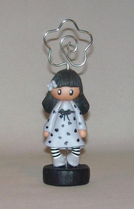 Porte-photo avec fillette en porcelaine froide