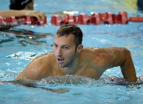 FILE - In this Nov. 4, 2011 file photo, Australia's Ian Thorpe takes a rest after finishing sixth in a heat of the Men's 100m Individual Medley at the FINA Swimming World Cup in Singapore. This is the Year of the Comeback in swimming. Janet Evans and Thorpe are attempting to make the London Olympics after long layoffs, but they're hardly alone.  (AP Photo/Bryan van der Beek, File)